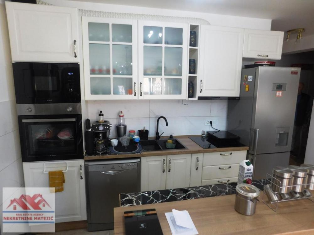 Slika 7 - MALA VAGA,NOVOGRADNJA 67M2, 2. SPRAT, CENTR. GREJANJE(KALORIMETAR)-127.000 E